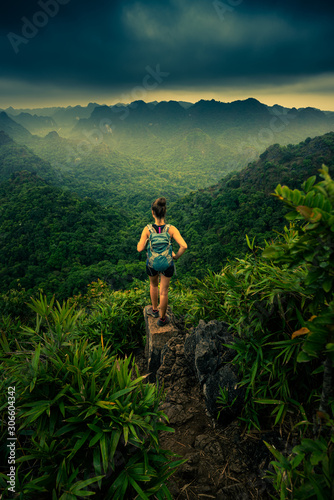 Canvastavla Cat Ba National Park Top of the Hill Young Woman enjoys beautiful view from the