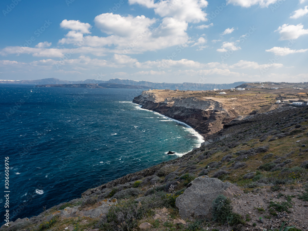 Santorini Island Rock Shore Sunny sky clouds Sea