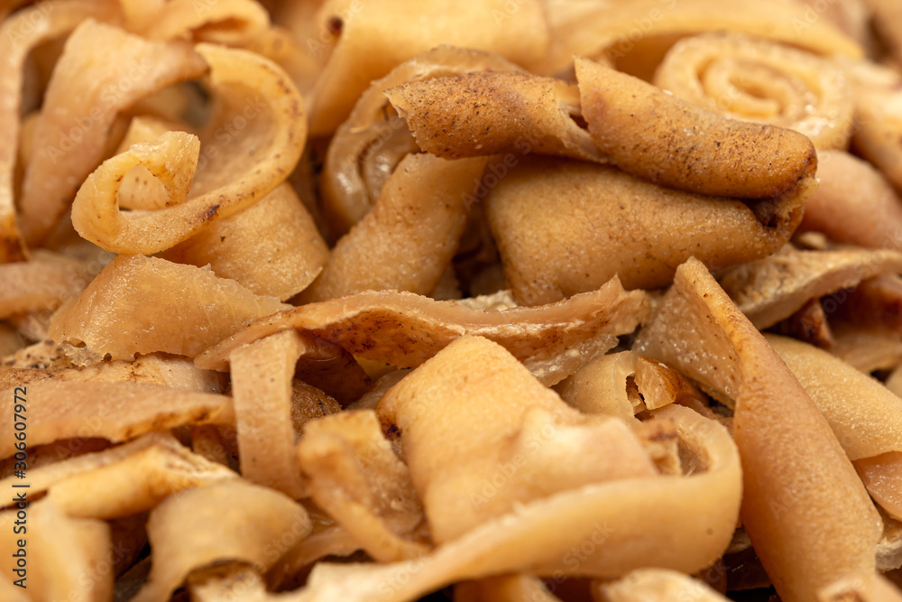 Smoked pork rind - soric afumat, Romanian traditional food at winter Christmas market Smoked pork rind - soric afumat, Romanian traditional food at winter Christmas market