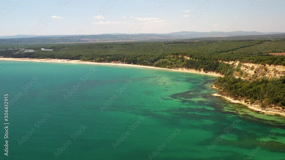 Aerial drone view of beautiful beach surrounded by incredible nature Aerial drone view of beautiful beach surrounded by incredible nature