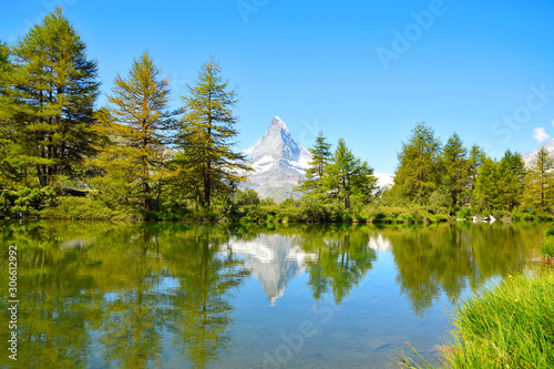 Fototapeta Naklejka Na Ścianę i Meble -  Gorgeous Matterhorn with reflection, the Grindjisee Lake and a clear blue sky, Zermatt, Switzerland