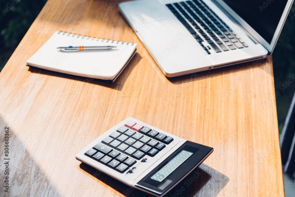 Workspace business laptop computer and calculator