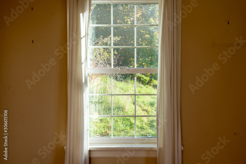 Old fashioned windows of a vintage home  closeup. 