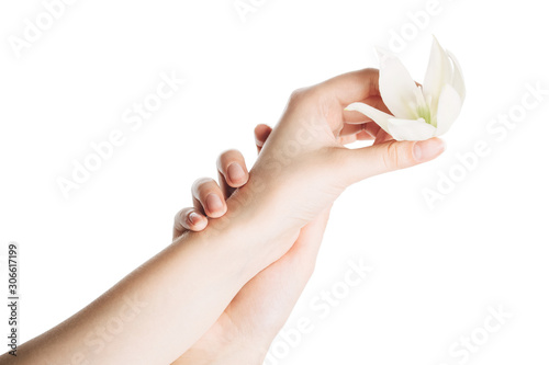 womans hand with a flower on the palm