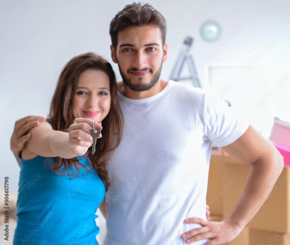 Young family moving to new apartment