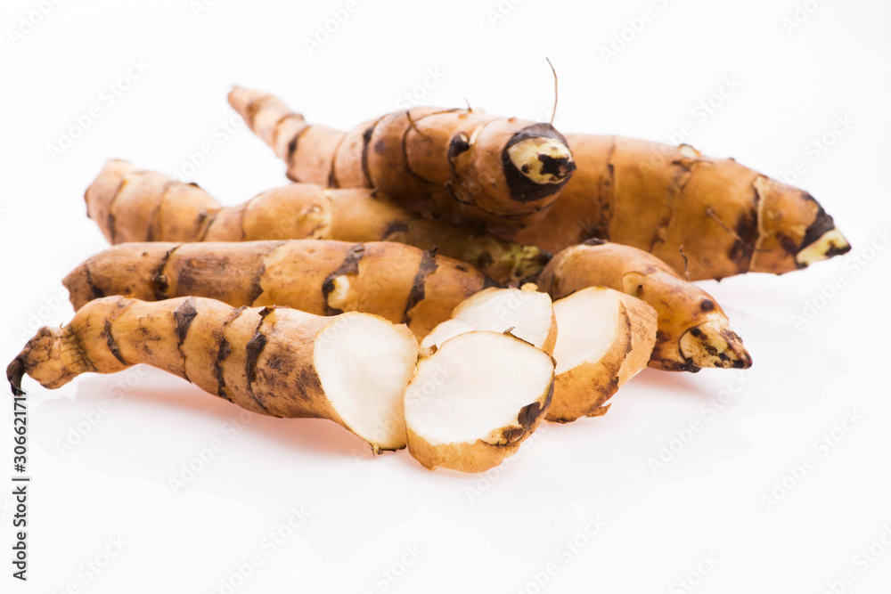 Raw Whole Jerusalem artichokes on a white background Raw Whole Jerusalem artichokes on a white background