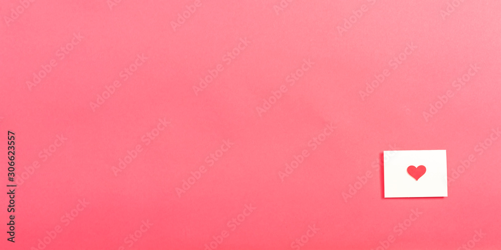 Valentine's day note card on a pink paper background Valentine's day note card on a pink paper background