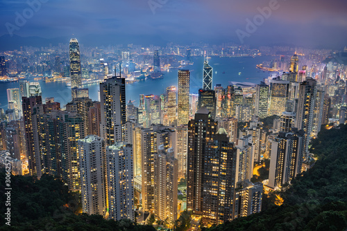 Hong Kong skyline dipped in a colorful foggy night taken from Victoria peak, Hong Kong, China