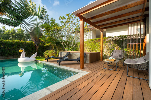 Swimming pool in tropical garden pool villa feature floating balloon photo