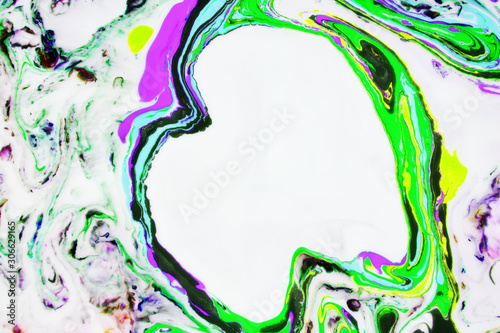 Modern painting in the technique of Ebru and suminagashi. Abstract drawings on water with acrylic paints.Marble liquid texture.