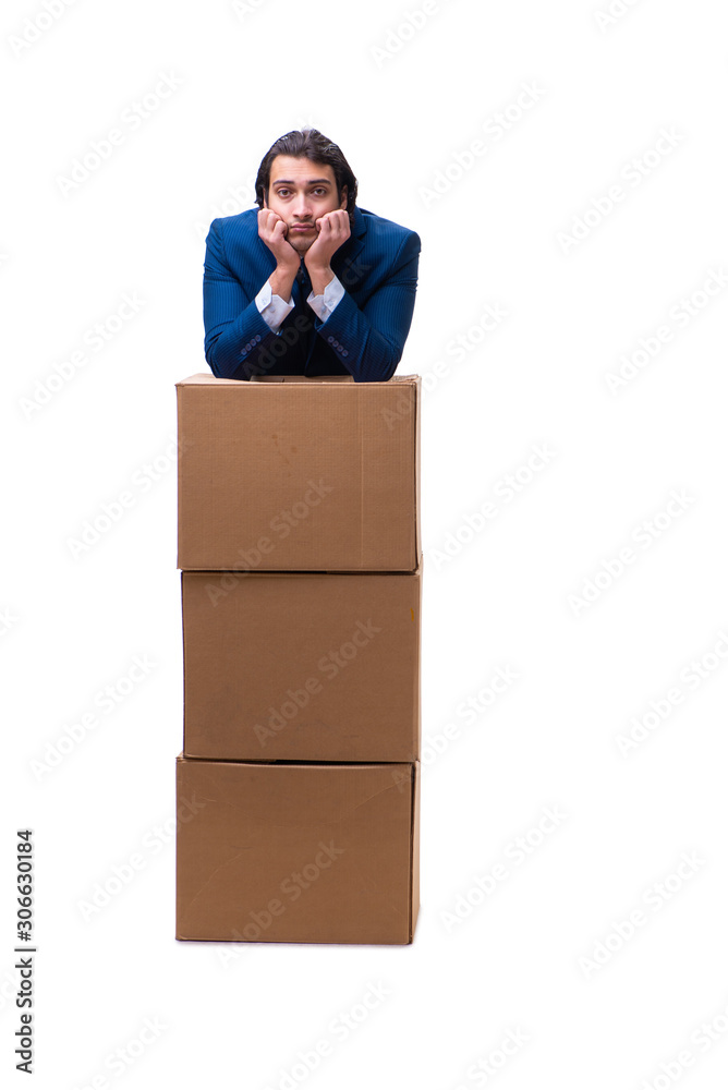 Young male employee with boxes isolated on white Young male employee with boxes isolated on white