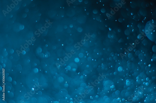 Abstract bokeh lights with light Blue background © Atthakan