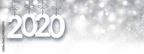 Grey shiny 2020 New Year bokeh banner.