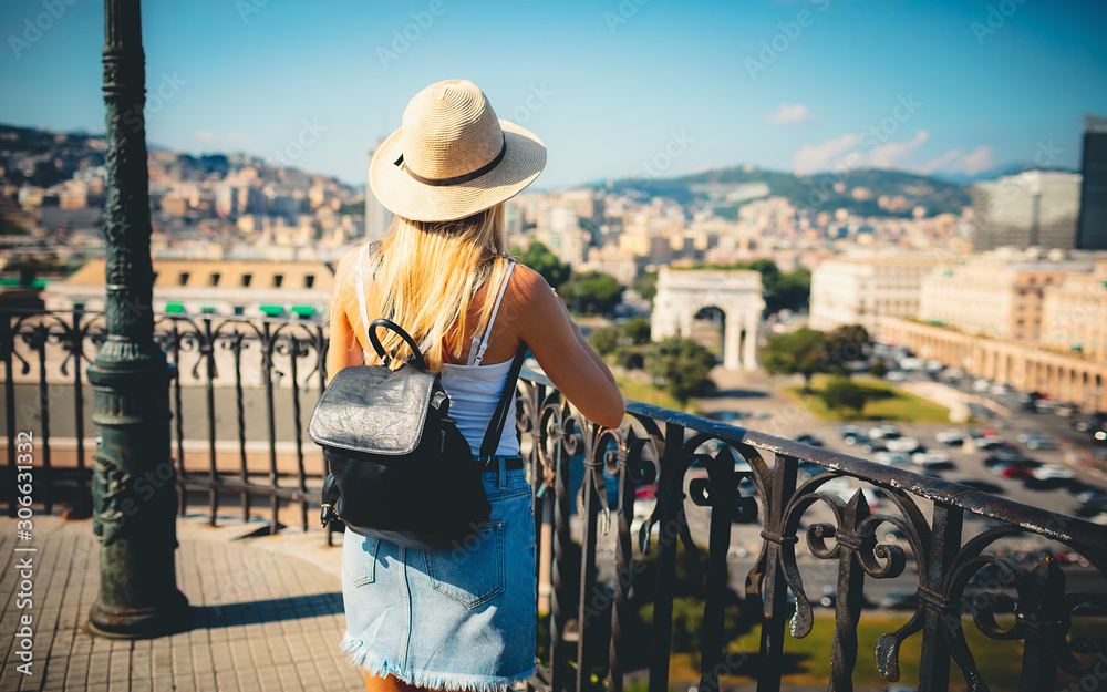 Rome Europe Italia travel summer tourism holiday vacation background - young girl with hat mobile phone and using action camera backpack in hand standing on the hill looking on the cathedral old city Rome Europe Italia travel summer tourism holiday vacation background - young girl with hat mobile phone and using action camera backpack in hand standing on the hill looking on the cathedral old city