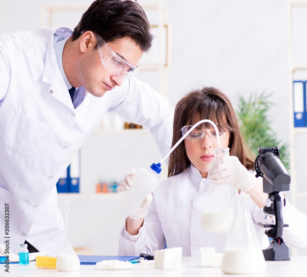 Two lab doctor testing food products Two lab doctor testing food products