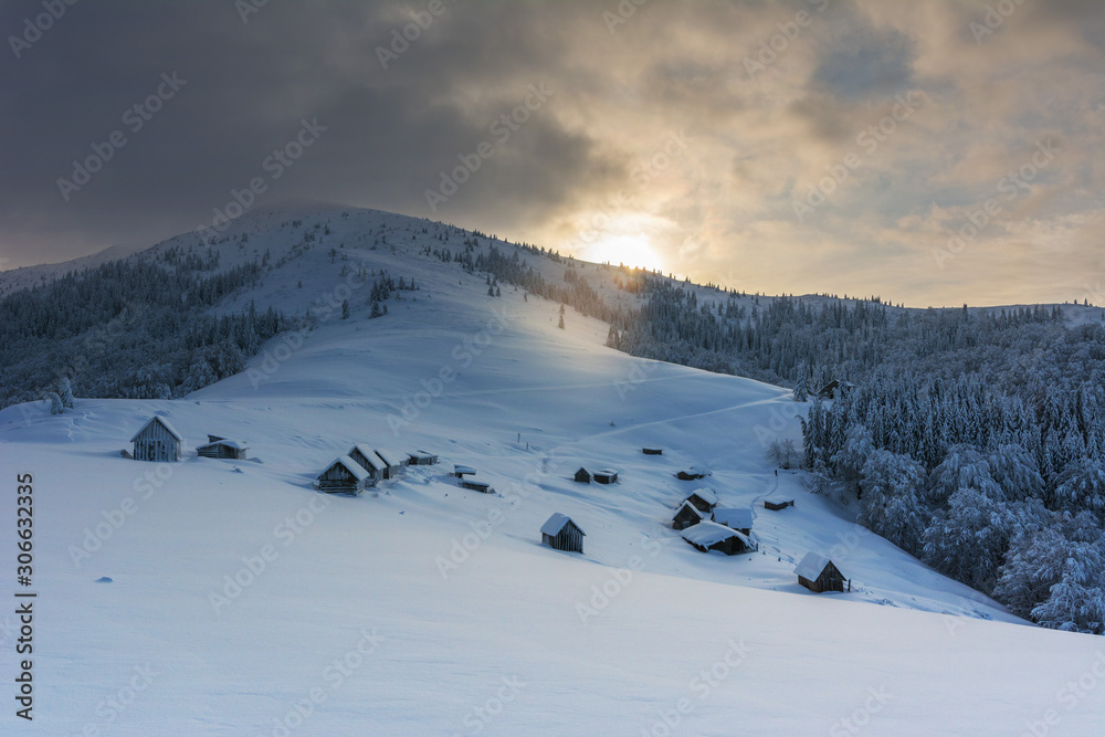 Wonderful morning in the mountainous valleys with houses in the Ukrainian Carpathians.	