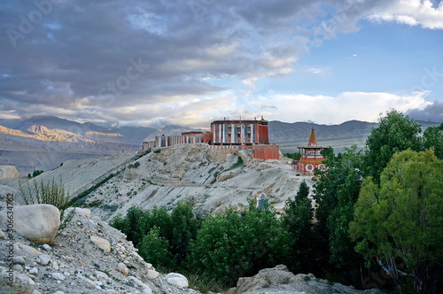Tsarang Gompa rises on a hill - a monastery of the Sakya sect, built in 1395. Trekking to the Upper Mustang closed area. Nepal.