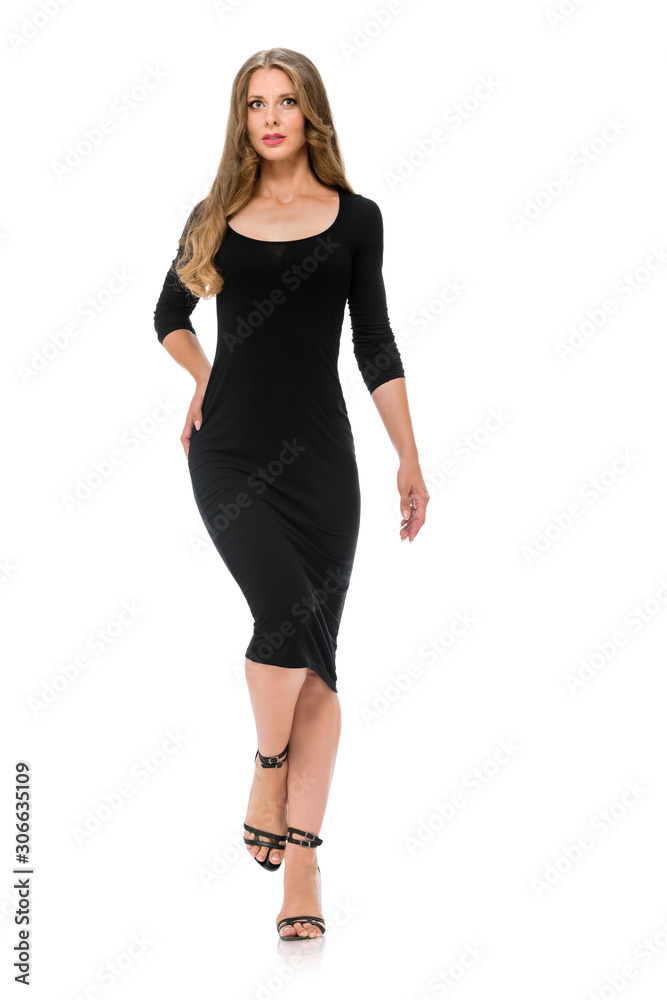 Beautiful elegent slender woman wearing black skinny dress Beautiful elegent slender woman wearing black skinny dress