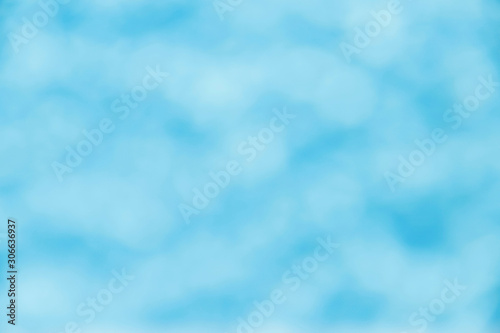 Gentle blue bokeh background. Abstract blurred background. Bokeh texture. Design concept. Horizontal
