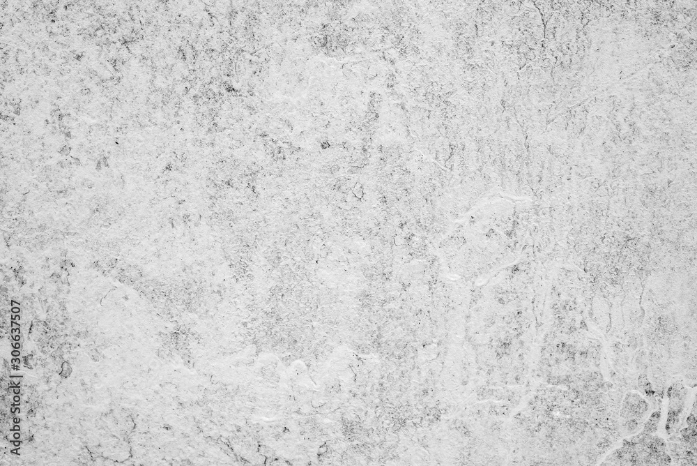 Texture of a concrete wall with cracks and scratches which can be used as a background