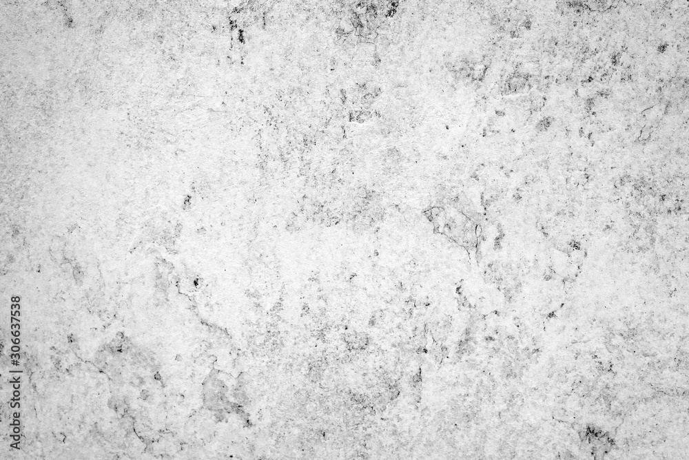 Fototapeta premium Texture of a concrete wall with cracks and scratches which can be used as a background