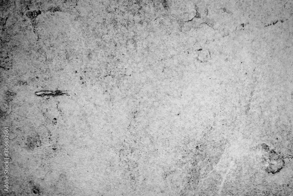 Texture of a concrete wall with cracks and scratches which can be used as a background Texture of a concrete wall with cracks and scratches which can be used as a background