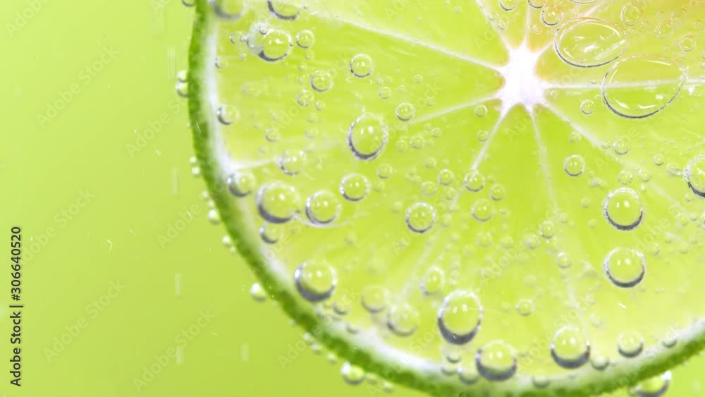 limes slice cold cocktail, lime refreshing with soda sparkling water bubbles.