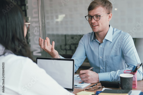 business people discussing on performance revenue in meeting. businessman working with businesswoman.