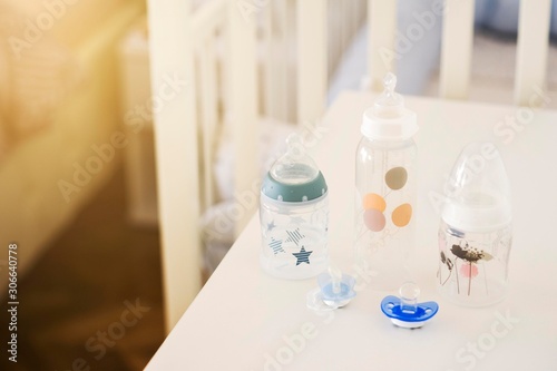baby milk bottle isolated on table. 