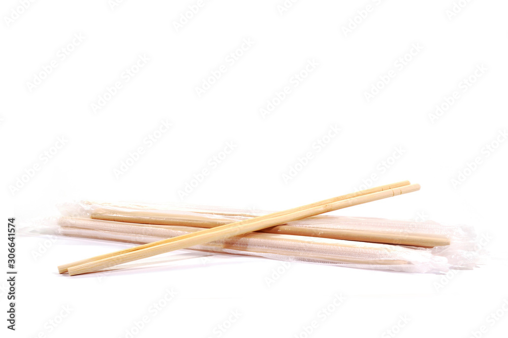 Bamboo chopsticks wrapped in plastic to prevent dust.