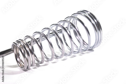 Silver spring steel wire on a white background.