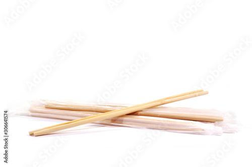 Bamboo chopsticks wrapped in plastic to prevent dust.