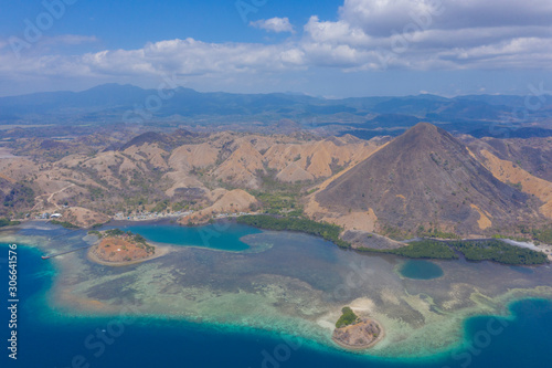 Aerial view of beautiful island in Indonesia. Kelor Island. Snorkeling and hiking acitivties. Near Komodo islands.