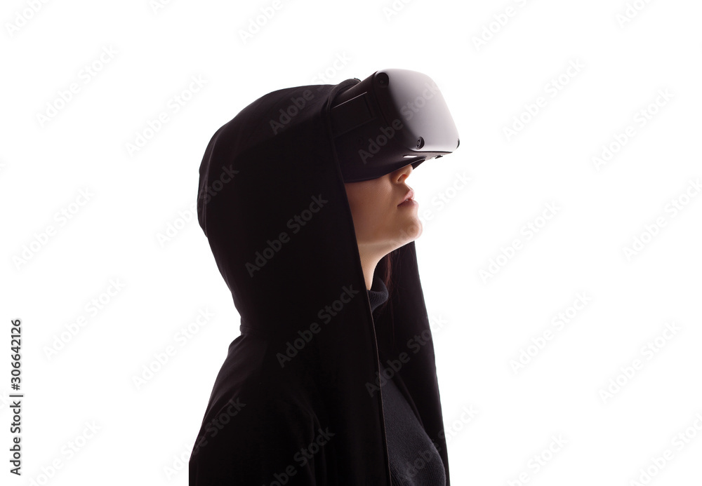 Beautiful woman using VR helmet on white background. Girl in glasses of virtual reality. Augmented reality, game, future technology concept. VR.