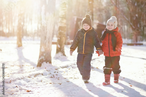 Children in winter park play