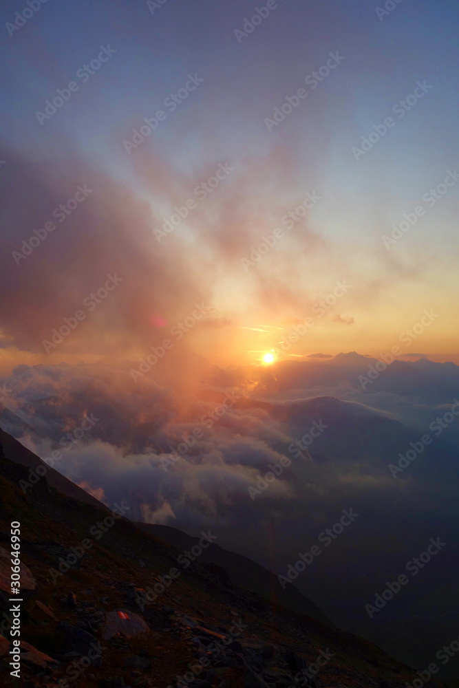 Sunrise from Biwak shelter on a hiking trail leading to Hoher Sonnblick mountain located in Hohen Tauern, Alps, Austria