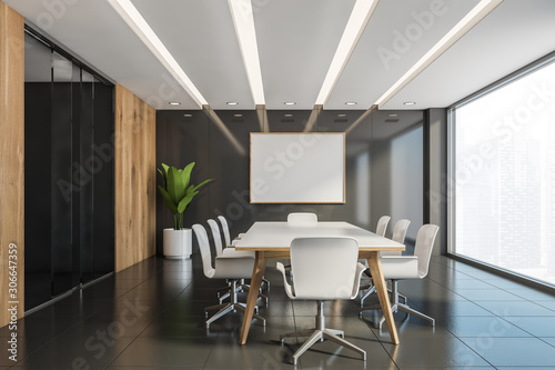 Wooden and gray conference room with poster © ImageFlow