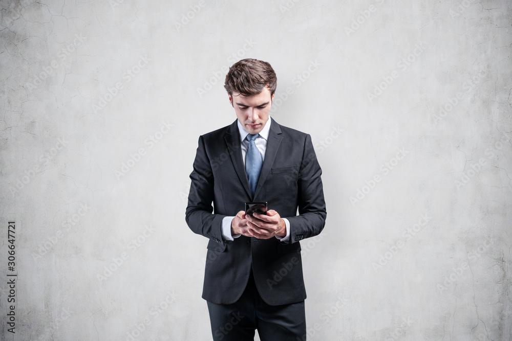 Front view of businessman looking at phone, mock up Front view of businessman looking at phone, mock up