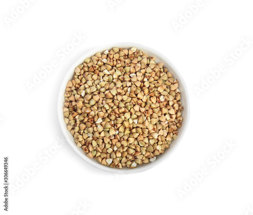 Green buckwheat in bowl isolated on white, top view