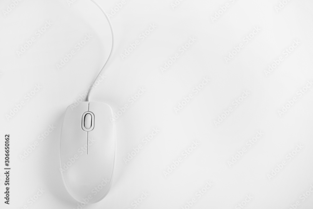 Modern wired optical mouse on white background, top view Modern wired optical mouse on white background, top view