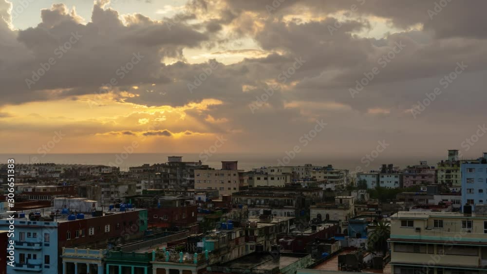 Aerial Time Lapse of the residential neighborhood in the Old Havana City, Capital of Cuba, during a colorful cloudy sunset. Aerial Time Lapse of the residential neighborhood in the Old Havana City, Capital of Cuba, during a colorful cloudy sunset.