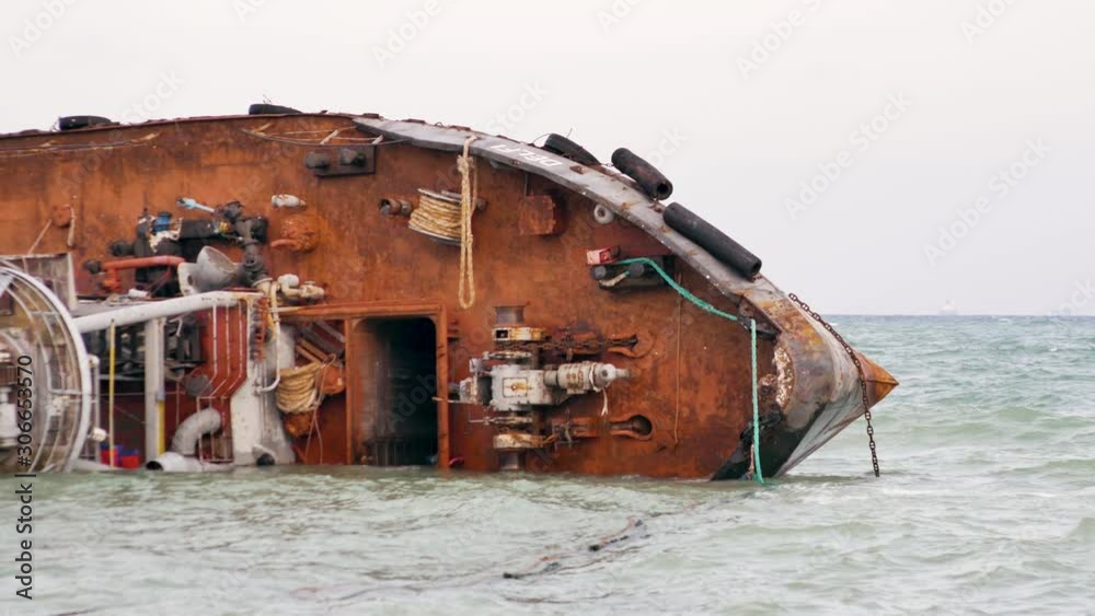 Ecological disaster. The tanker ship crashed and ran aground. Oil pollution of the sea Ecological disaster. The tanker ship crashed and ran aground. Oil pollution of the sea