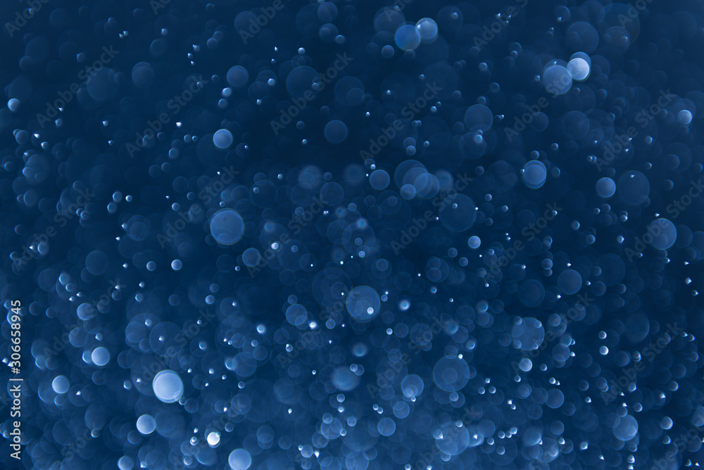 abstract sparkle bokeh light effect with navy blue background abstract sparkle bokeh light effect with navy blue background