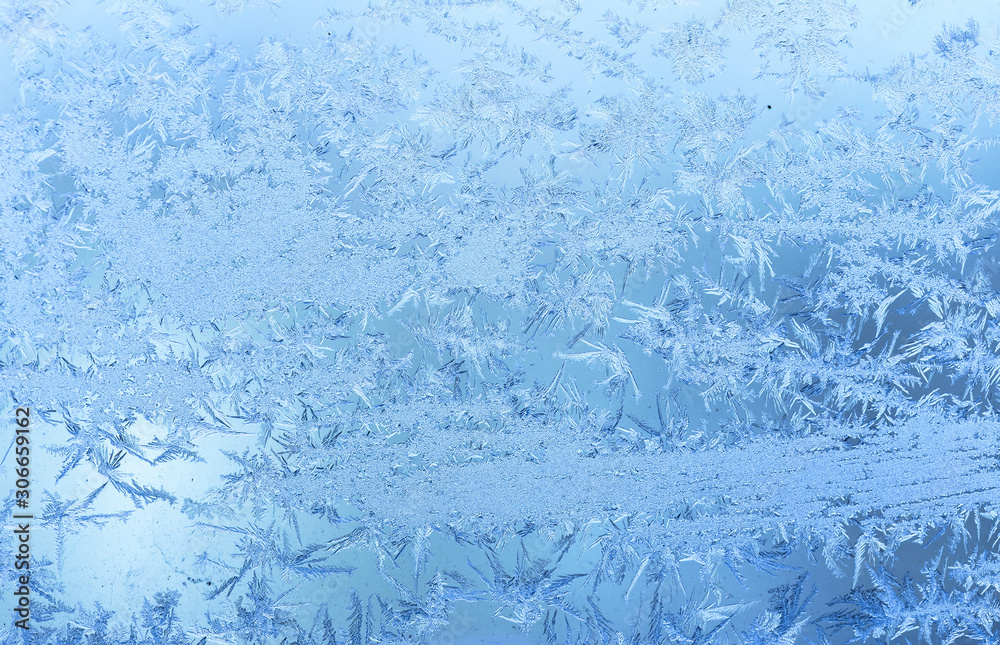 Beautiful winter texture of hoar frost on window frozen glass. Beautiful winter texture of hoar frost on window frozen glass.