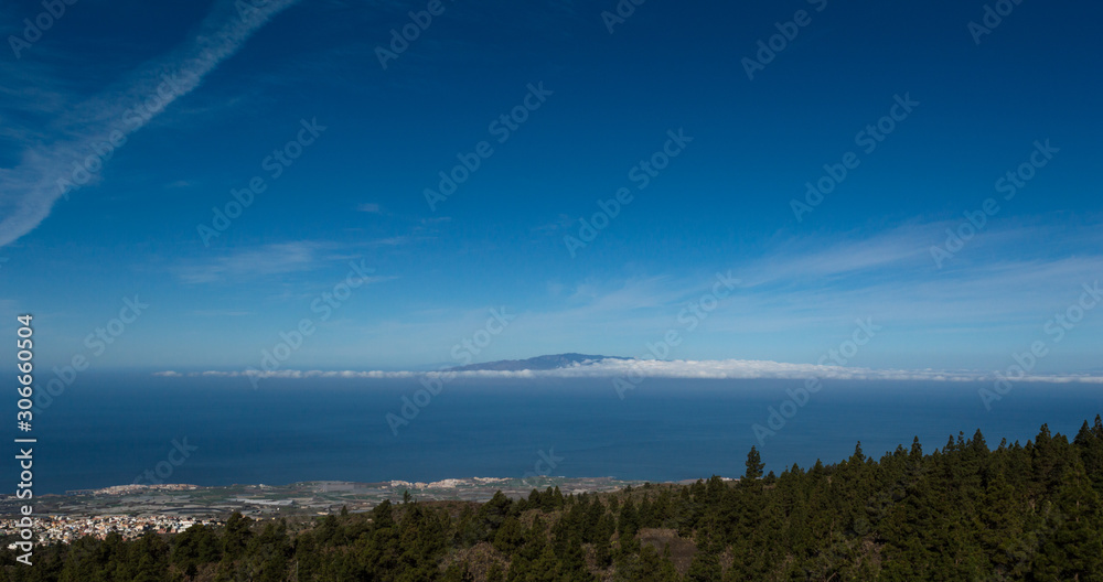 View from the peak of Mount Teide on the Island of Tenerife showing the deep blue sky