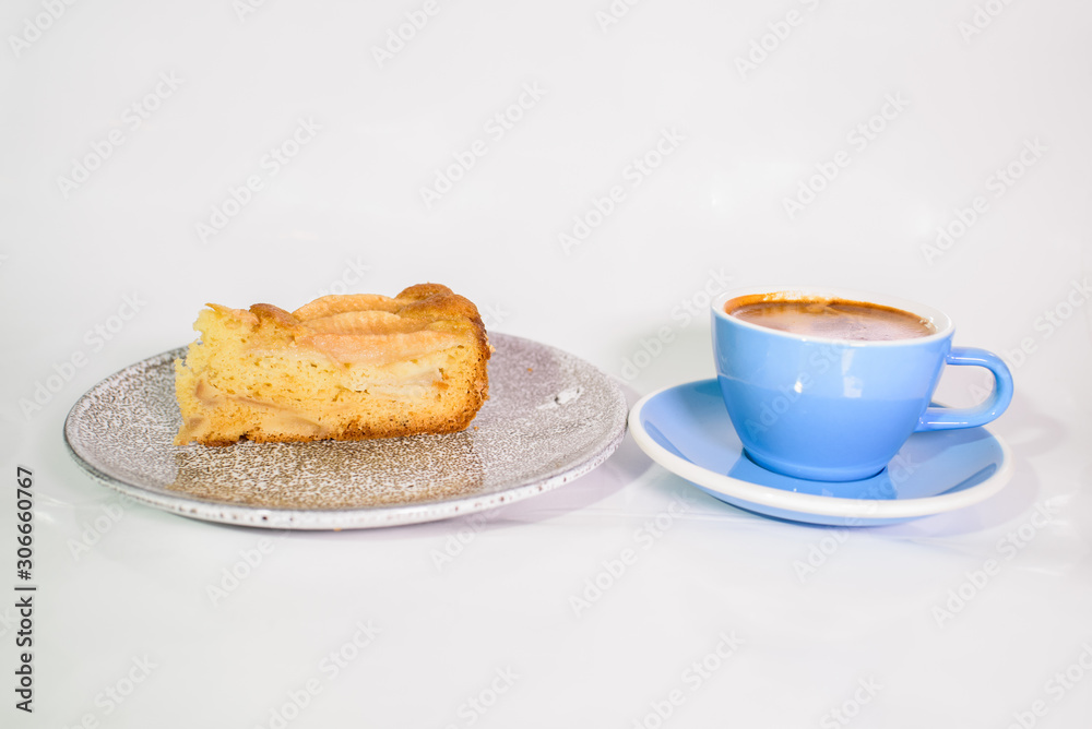Charlotte of pears and cappuccino on a white background Charlotte of pears and cappuccino on a white background