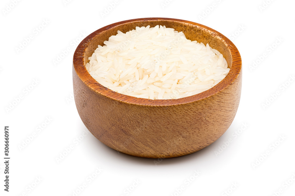 Rice in a wooden bowl on white background with clipping path. Rice in a wooden bowl on white background with clipping path.