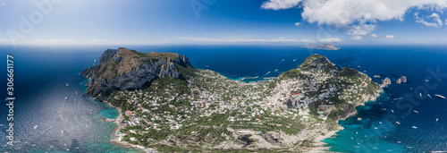 Aerial drone panoramic view of south Capri Island with faraglioni in Tyrrhenian sea photo