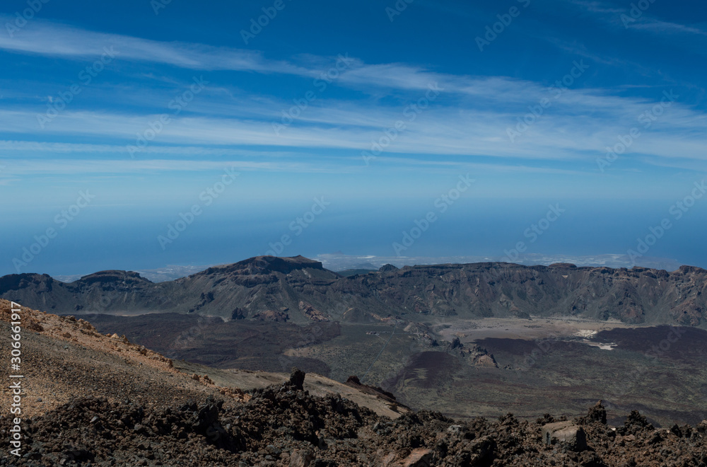 View from the peak of Mount Teide on the Island of Tenerife showing the deep blue sky