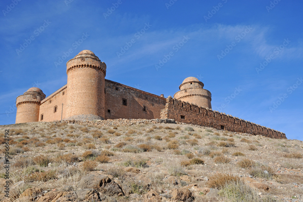 View of the castle, built 1509 - 1512, (Castillo de La Calahorra) and town, La calahorra, Granada Province, Andalucia, Spain